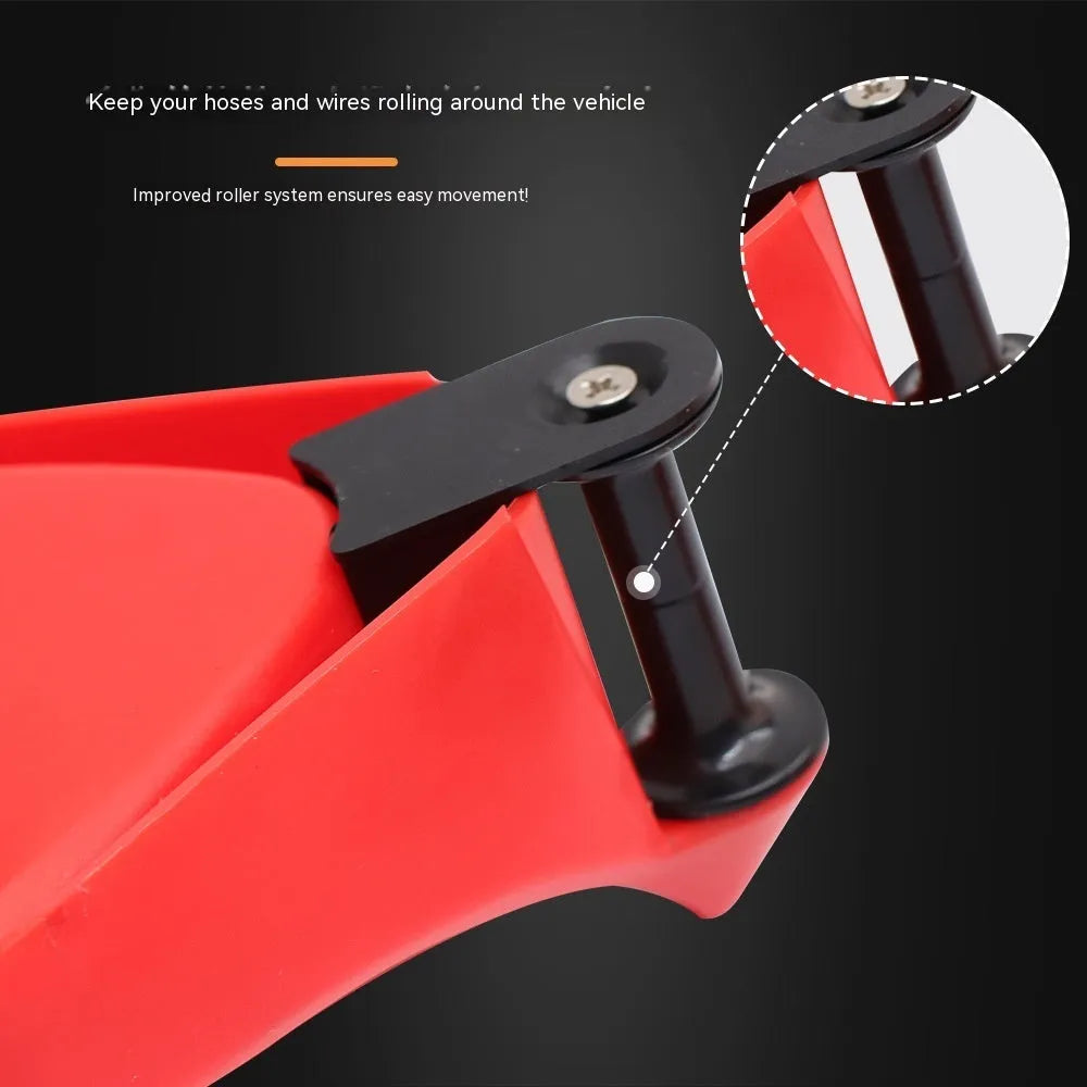 Set of four red plastic and black rubber triangle car parking blocks or wheel stops