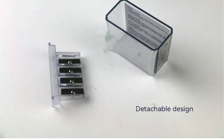 Geometric plastic pencil sharpener with four holes and an included screwdriver for blade maintenance.