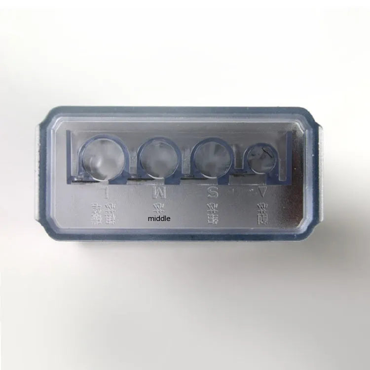 Geometric plastic pencil sharpener with four holes and an included screwdriver for blade maintenance.