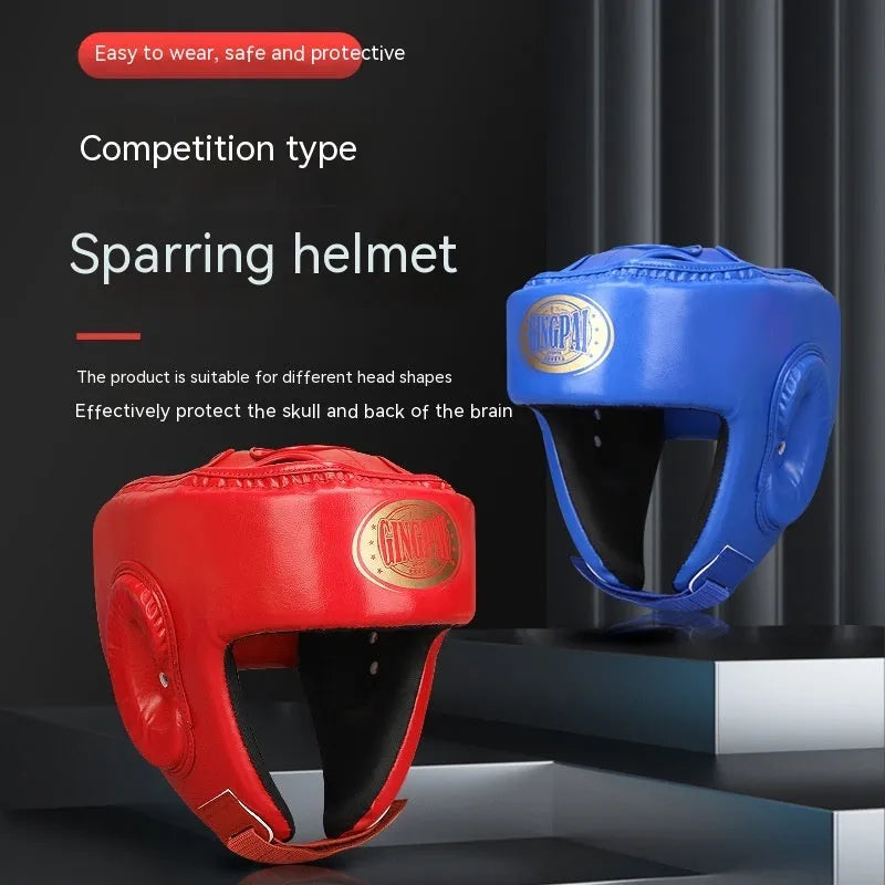 Red fully enclosed boxing helmet with jaw protection and vertical ventilation channels