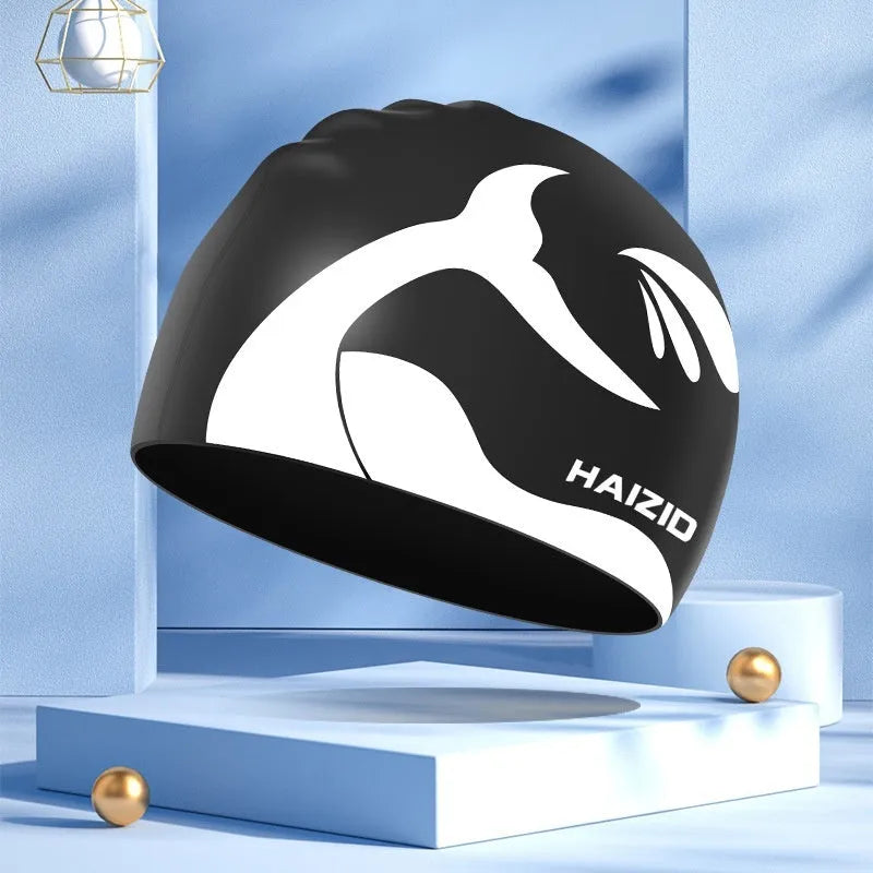Silicone swimming cap with whale tail design and waterproof ear protectors in four colour options