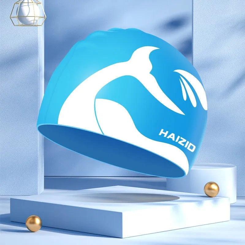 Silicone swimming cap with whale tail design and waterproof ear protectors in four colour options