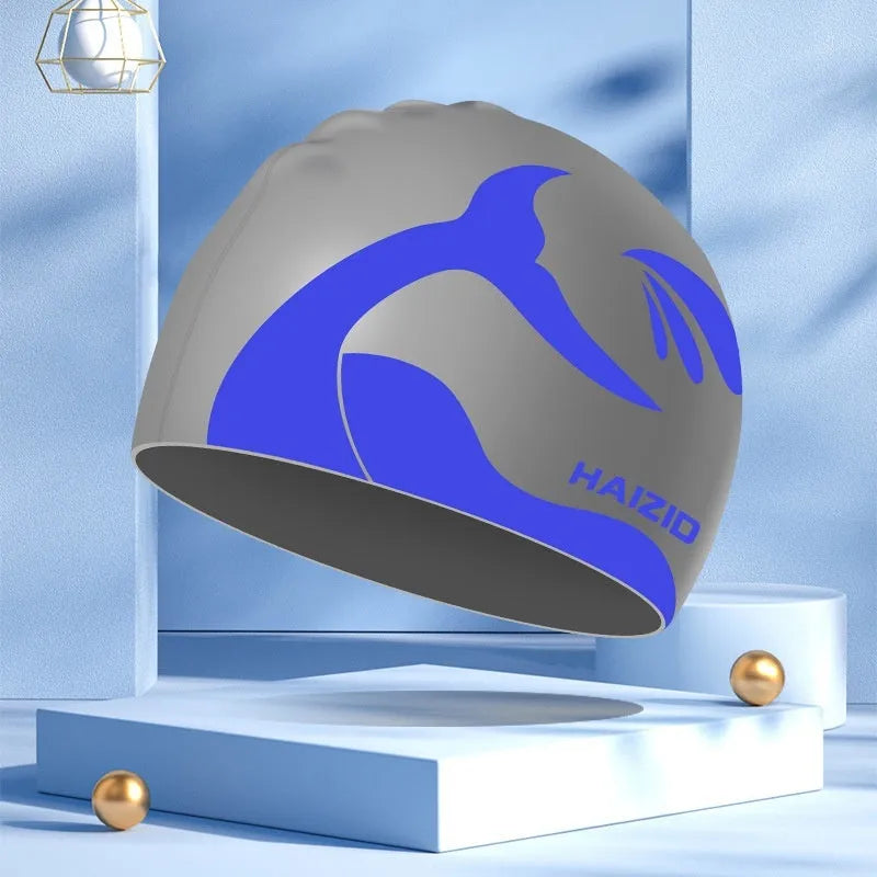 Silicone swimming cap with whale tail design and waterproof ear protectors in four colour options