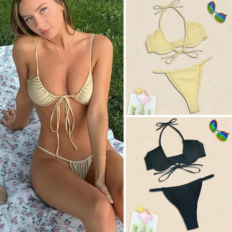 Black and mint green women's two-piece nylon swimsuit bikini set on a white background