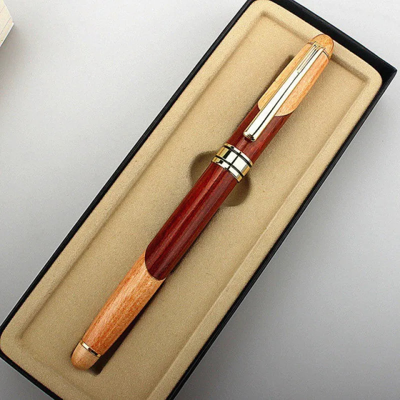 Wooden ballpoint pen with metal details shown alongside its grey fabric carrying bag.
