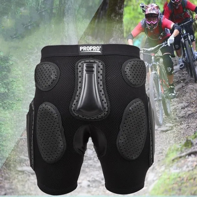 Black adult cycling protective pants with hip pads for mountain biking safety.