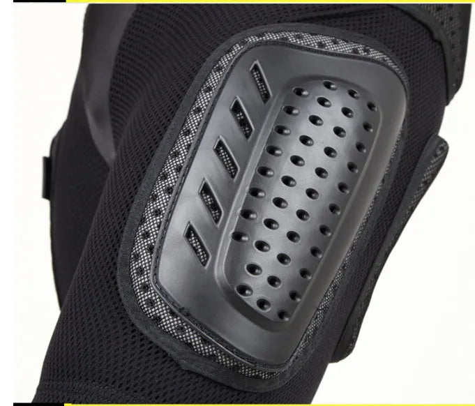 Black adult cycling protective pants with hip pads for mountain biking safety.