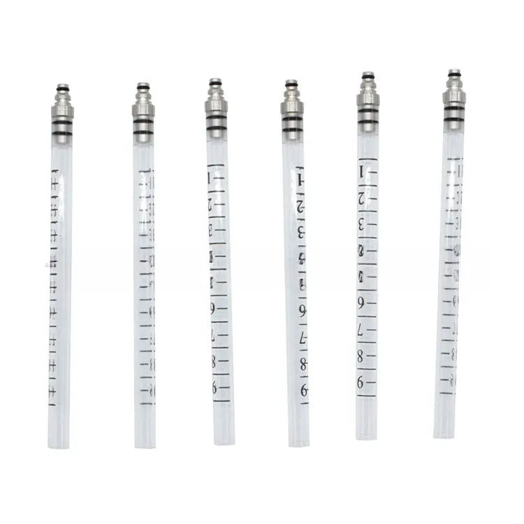 Brass and plastic fuel injection flow meter tool for testing engine injectors