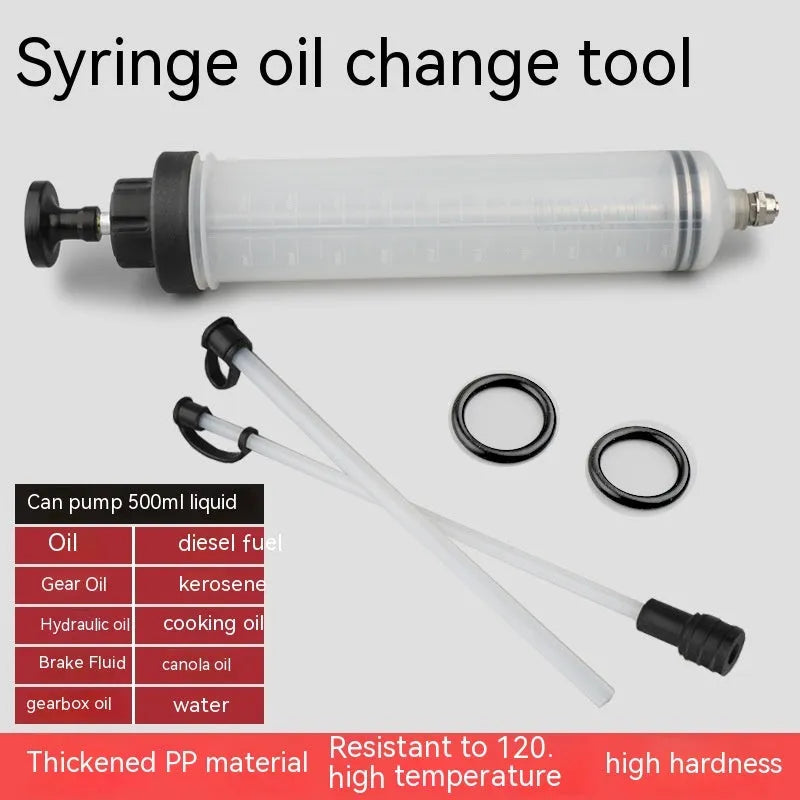 Manual oil pump syringe tool with suction and injection ports for fluid transfer