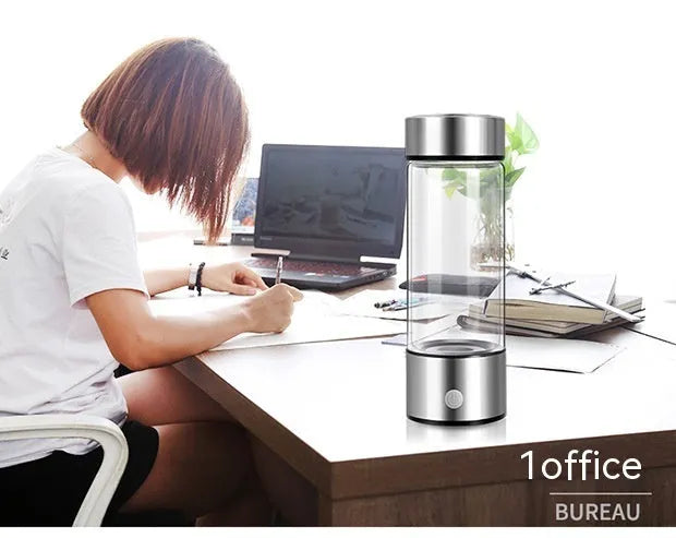 Silver electric hydrogen water generator bottle with borosilicate glass cylindrical design