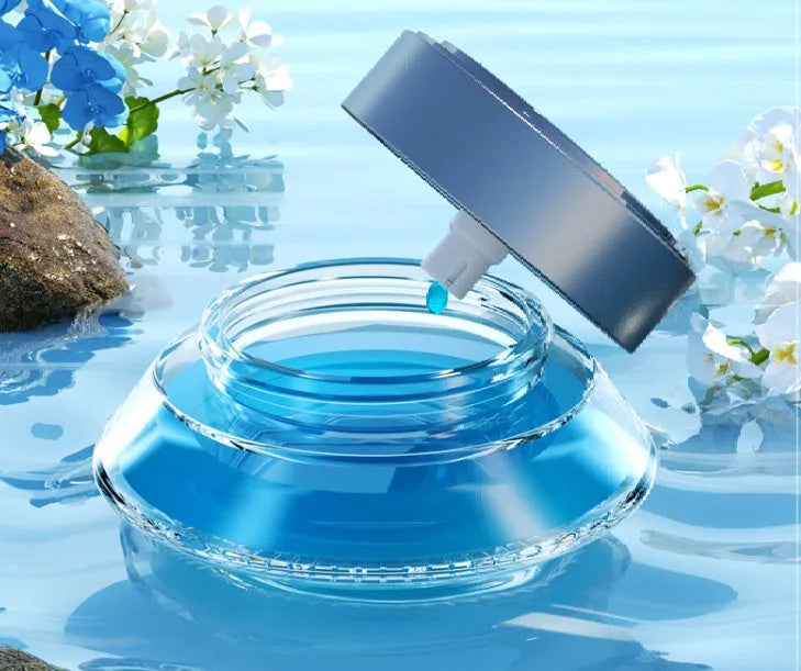 Smart Spray rechargeable car air freshener unit in black or green, with 50ml refill bottles for Ocean and Gulong scents.