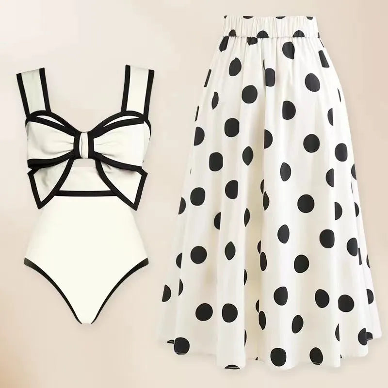 Women's black one-piece swimsuit with white bow and round skirt beach dress design