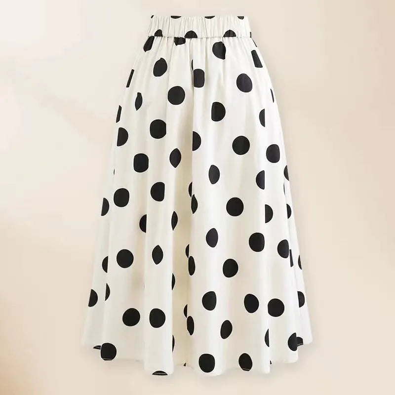 Women's black one-piece swimsuit with white bow and round skirt beach dress design