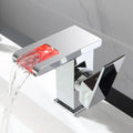 Waterfall basin faucet with chrome finish and induction sensor for hands-free bathroom use