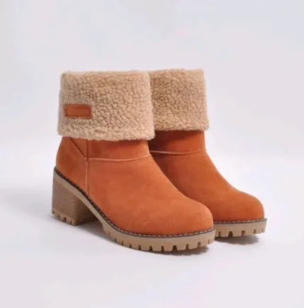 Women's suede mid-calf snow boots with thick flat sole in black, shown from the side.