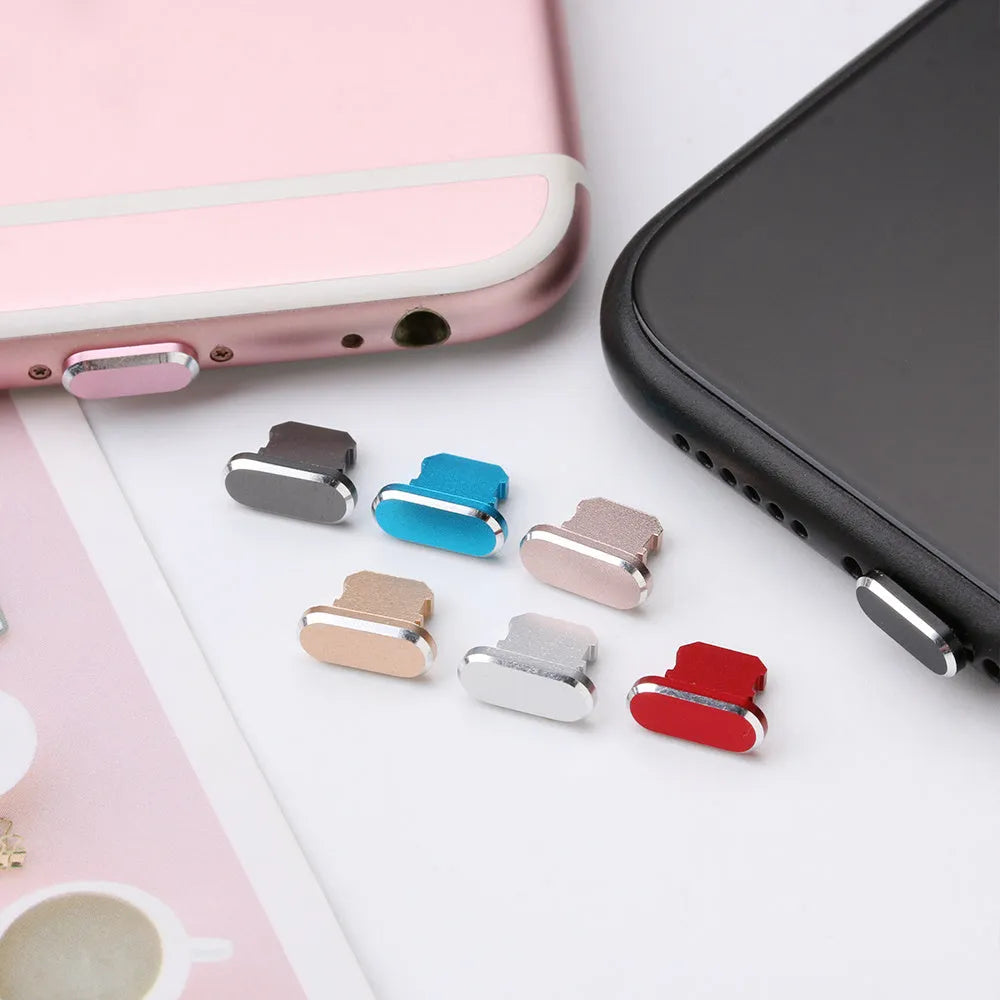 Aluminium alloy iPhone charging port dust plug in gold, silver, blue, red, grey, black, and rose gold colours.