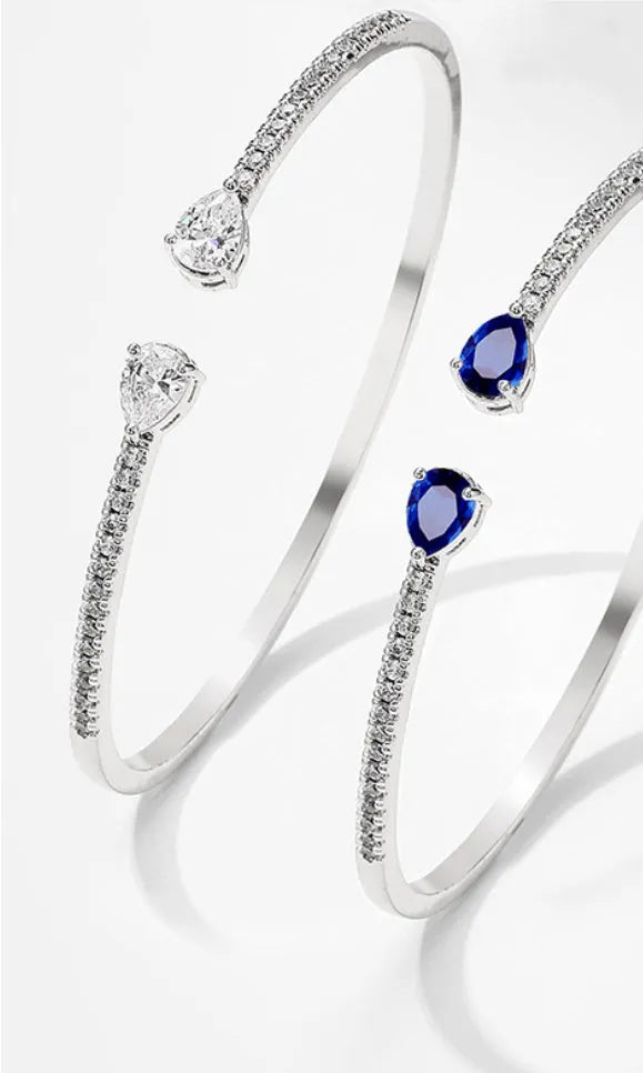 Multi-zircon personalised fashion bracelet with inlaid treatment on copper in blue and white options