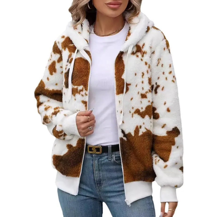 Yellow brown cow print hooded cardigan jacket with front zipper on female model