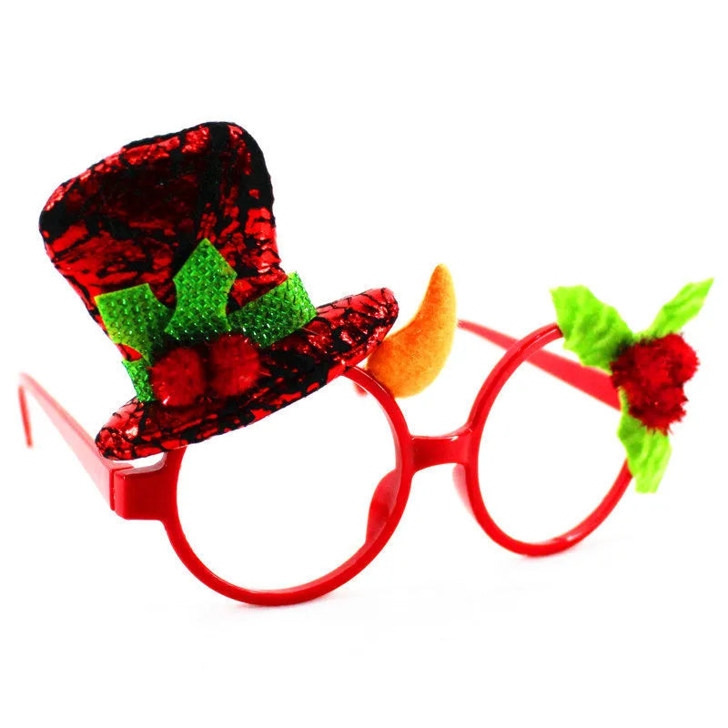 Set of four Christmas novelty glasses: Santa, Snowman, antlers, and rabbit ears designs.