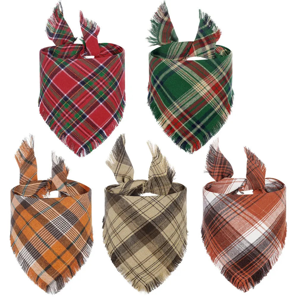 Classic plaid dog bandana with tasselled edges in autumn colours tied around dog's neck