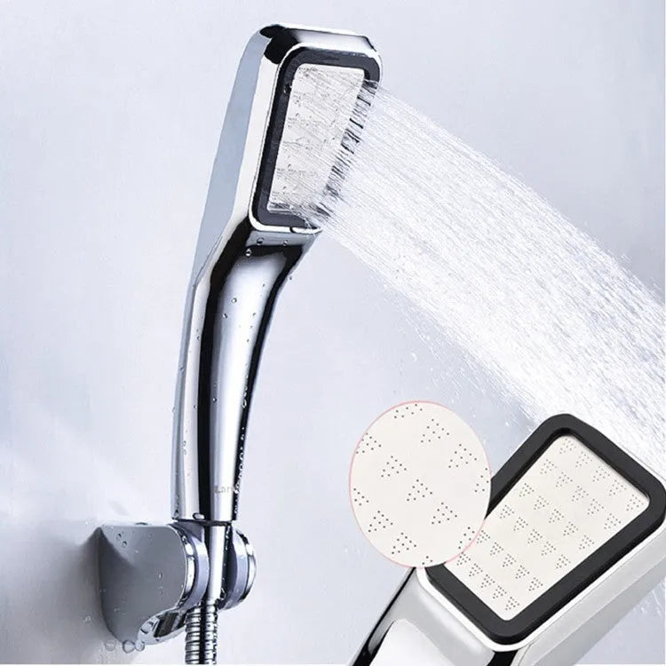 Orange hand-held pressurised shower with rain function spray head