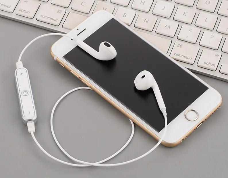 Wireless Bluetooth headset compatible with iPhone 7 and 6 models in black, white, gold, or silver.