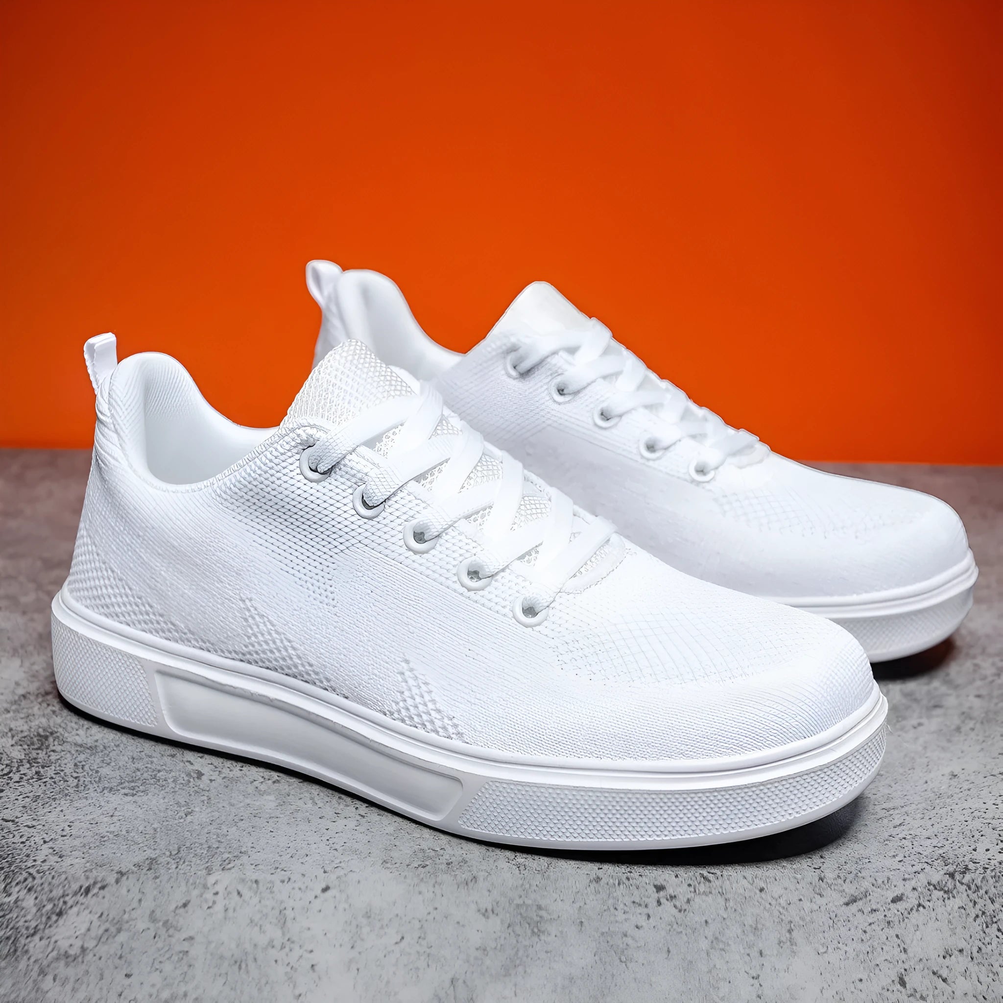 Light casual sports shoes with mesh upper and thick EVA sole in black and white colours
