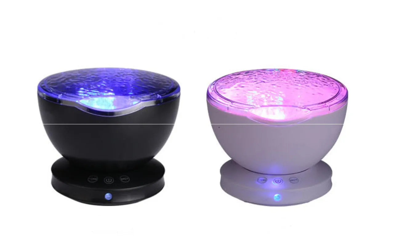 White and blue ocean wave projector LED night light with remote control, measuring 13x12x12 cm