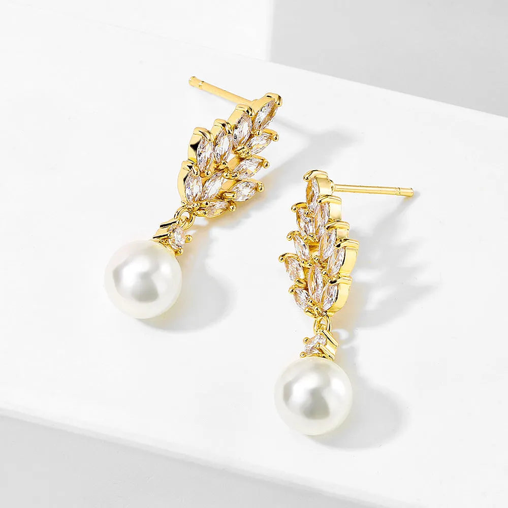 Micro inlaid zircon pearl earrings with geometric floral design in gold, platinum, or rose gold plating.
