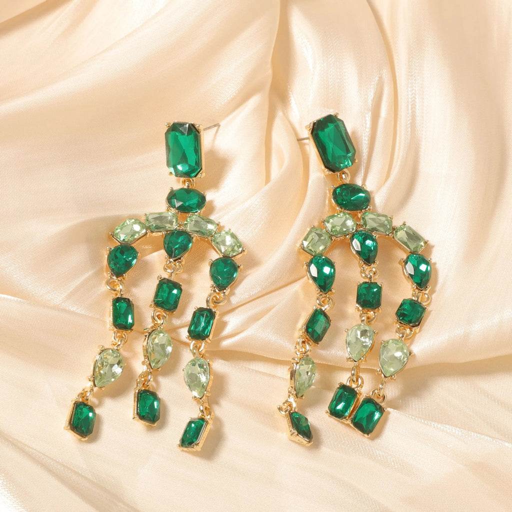 Heavy-duty full-drop diamond teardrop fringe earrings in zinc alloy, green colour, on display