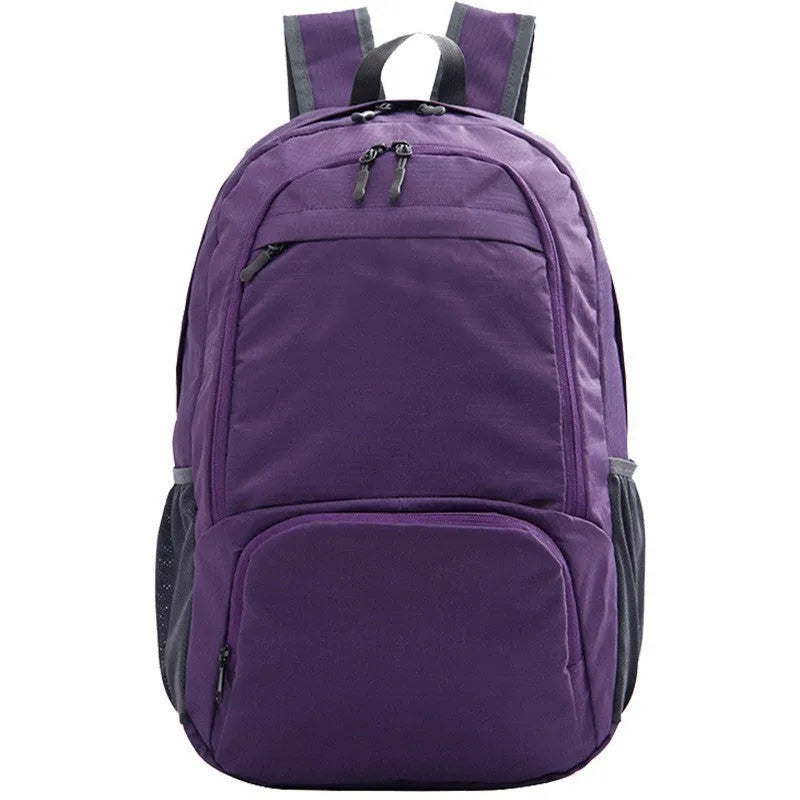 26-inch foldable backpack in waterproof Oxford cloth, shown in one of seven colour options.