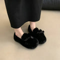 Ladies winter warm bow tie shoes with suede upper, plush lining, and rubber sole in black
