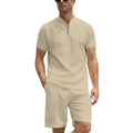 Men's solid colour polo shirt and matching trousers two-piece set in textured fabric.