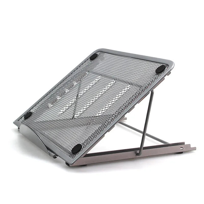 Folding aluminium laptop stand in silver colour, shown at an angle with a laptop on it