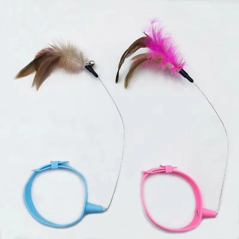 Silicone cat feather collar toy with adjustable teasing wand and bell attachment in blue and pink colours