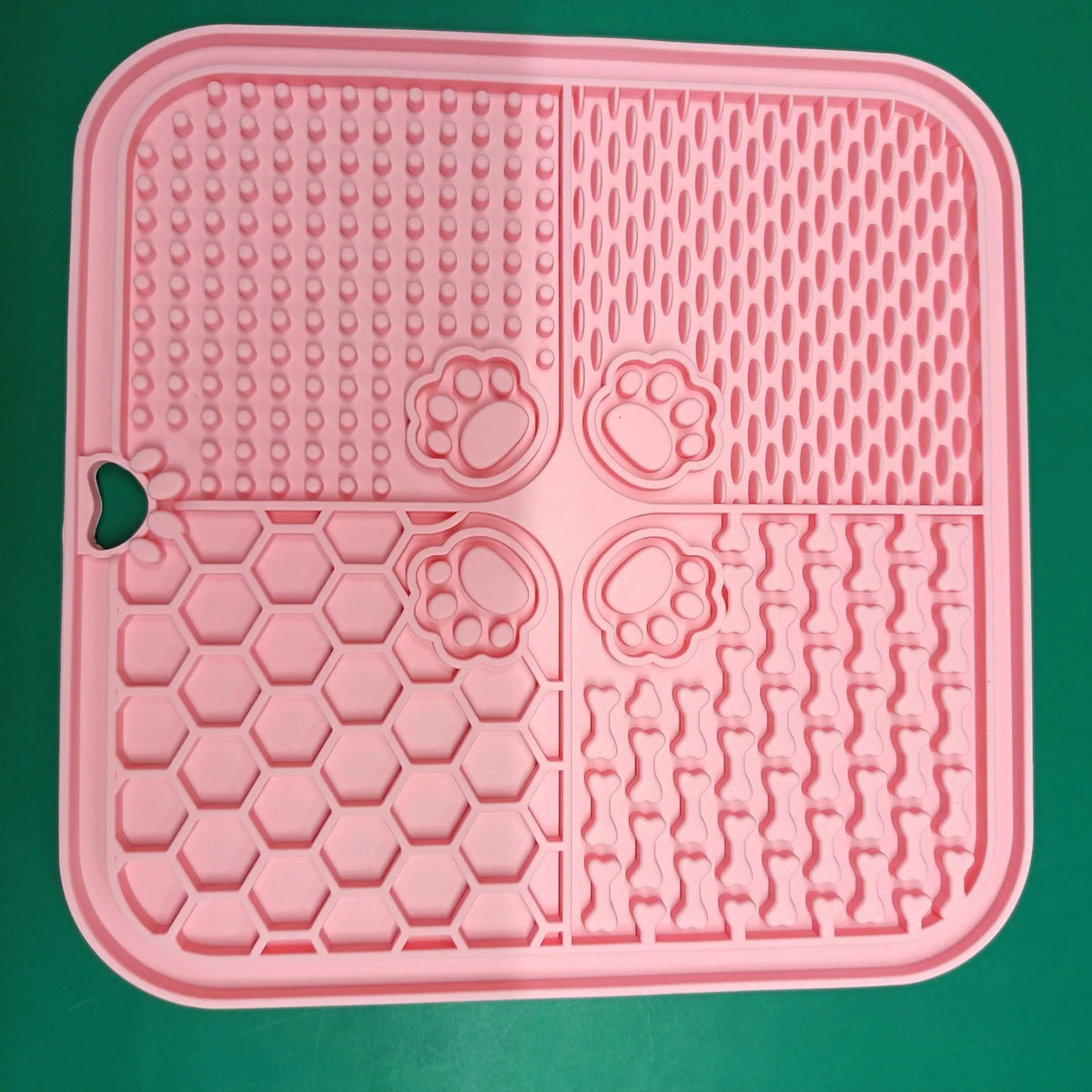 Silicone dog slow food mat in assorted colours including red, sky blue, and yellow, pet tableware for slow feeding