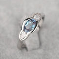 Women's geometric ellipse copper ring with inlaid zircon stone in white gold colour.