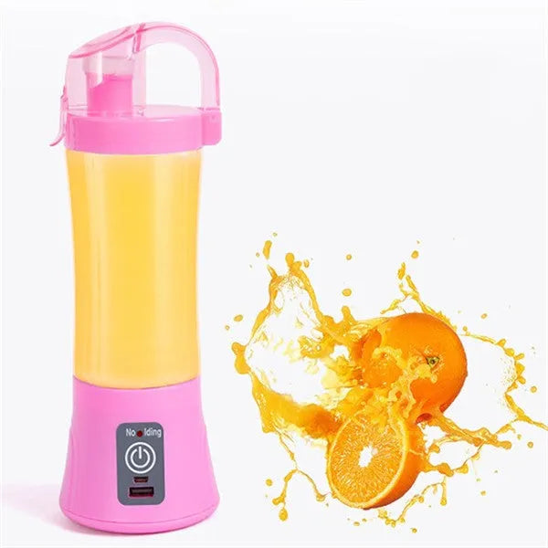 Blue portable handheld USB rechargeable blender with a 400ml clear cup on a table.