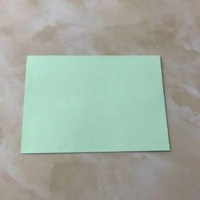 Mini coloured paper envelopes measuring 11.5 by 8 centimetres in various colours