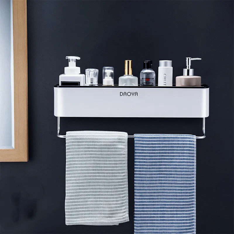 Plastic bathroom wall shelf with hole-free installation, shown holding shampoo and shower gel bottles.