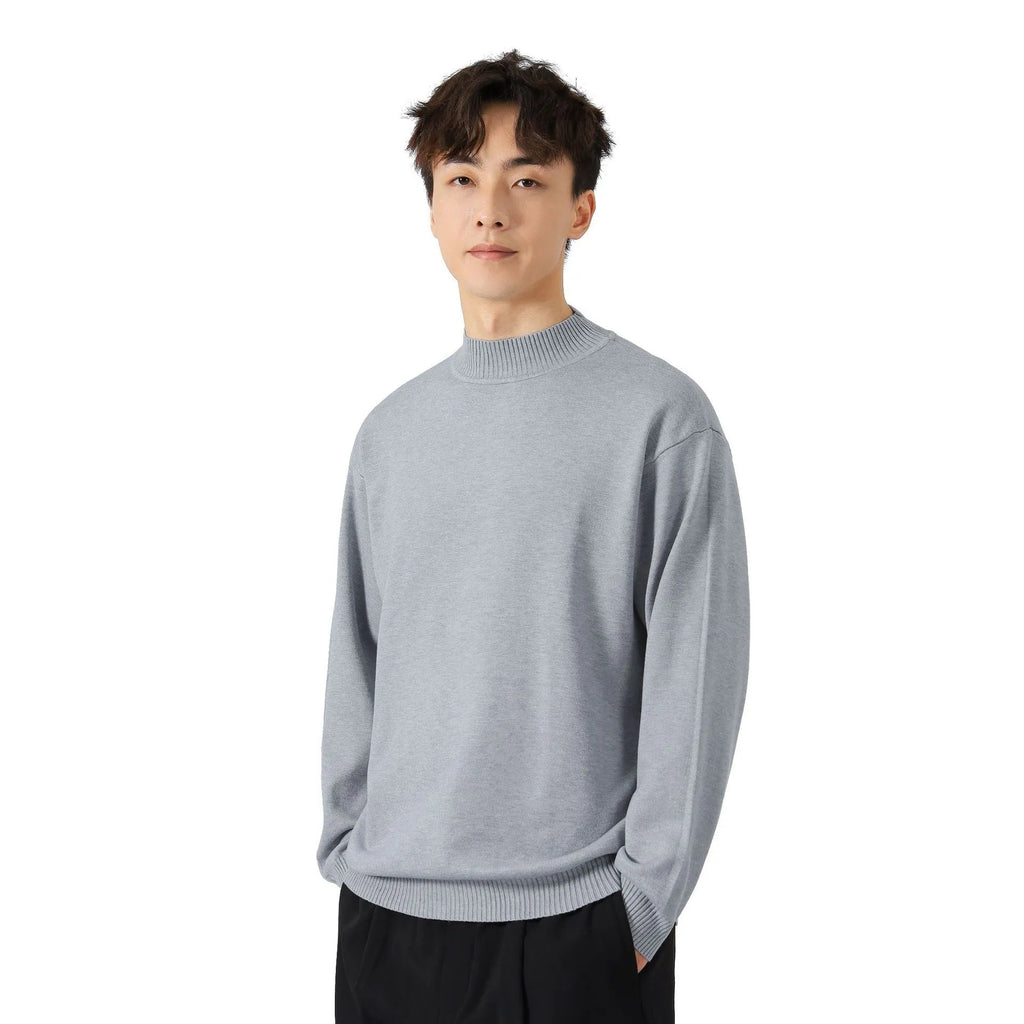 Men's loose fit long sleeve pullover sweater in a neutral colour on a hanger