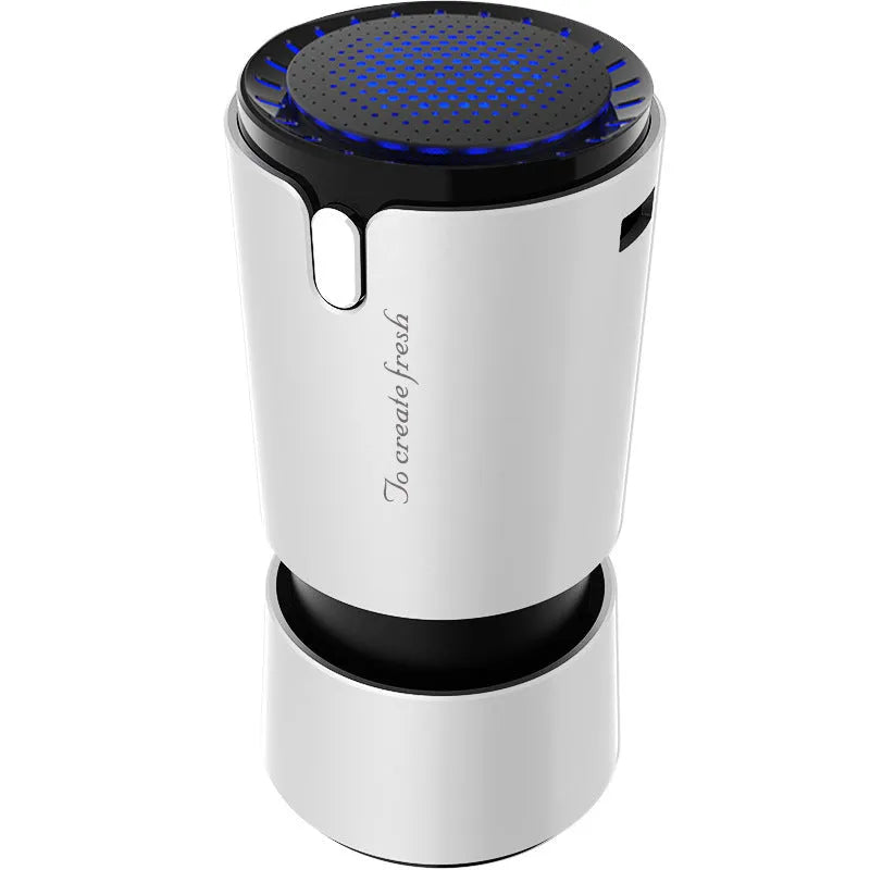 Portable mini car air purifier with True HEPA filter, USB powered, compact cup design in black