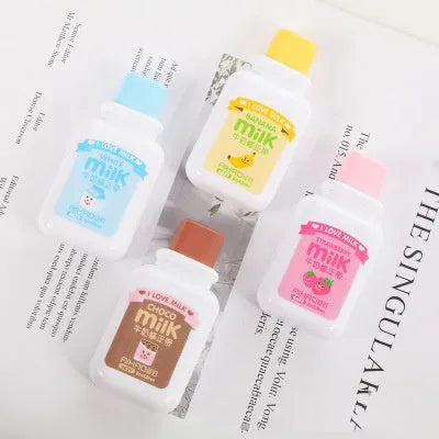 White creative correction tape dispenser shaped like a cute bottle with a curved ergonomic design