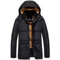 Men's black velvet padded jacket with hood and double-breasted button front, shown on a model.