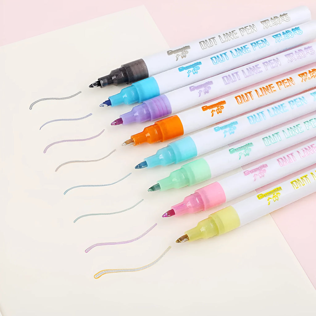 Set of eight fluorescent highlighter pens with 2mm tips next to their storage box.