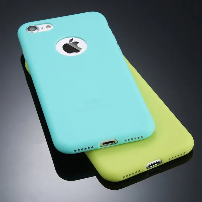 Soft silicon TPU phone case for iPhone in candy colours including pink, blue, and black on a white background.