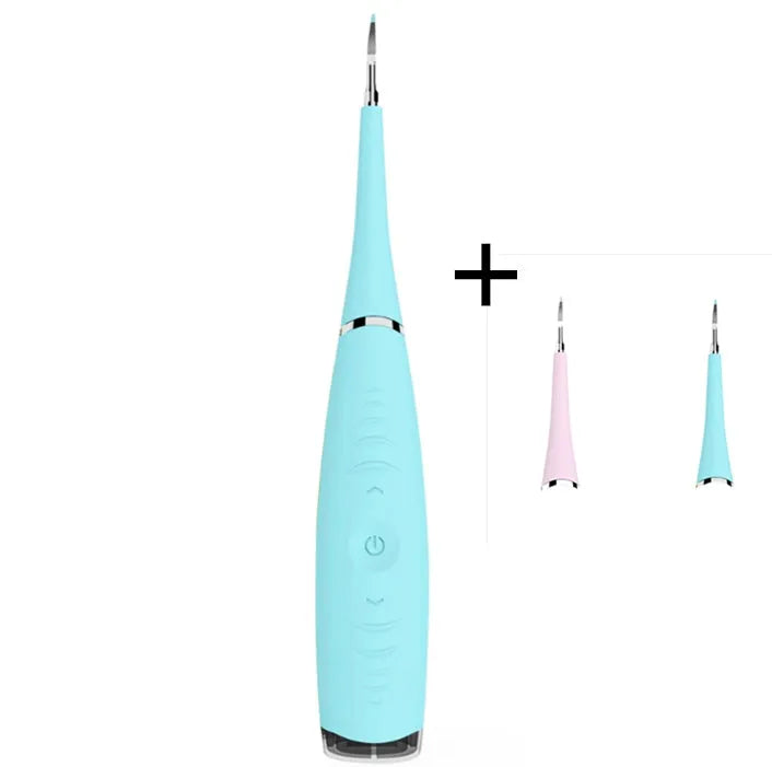 Pink and blue electric dental scaler tool with silicone handle on a bathroom counter.