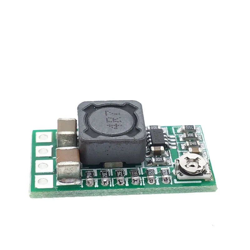 Green 25x21mm DC-DC buck converter module for 12-24V to 5V conversion