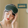 Pink and green portable USB steam sleep massage goggles for eye relaxation.