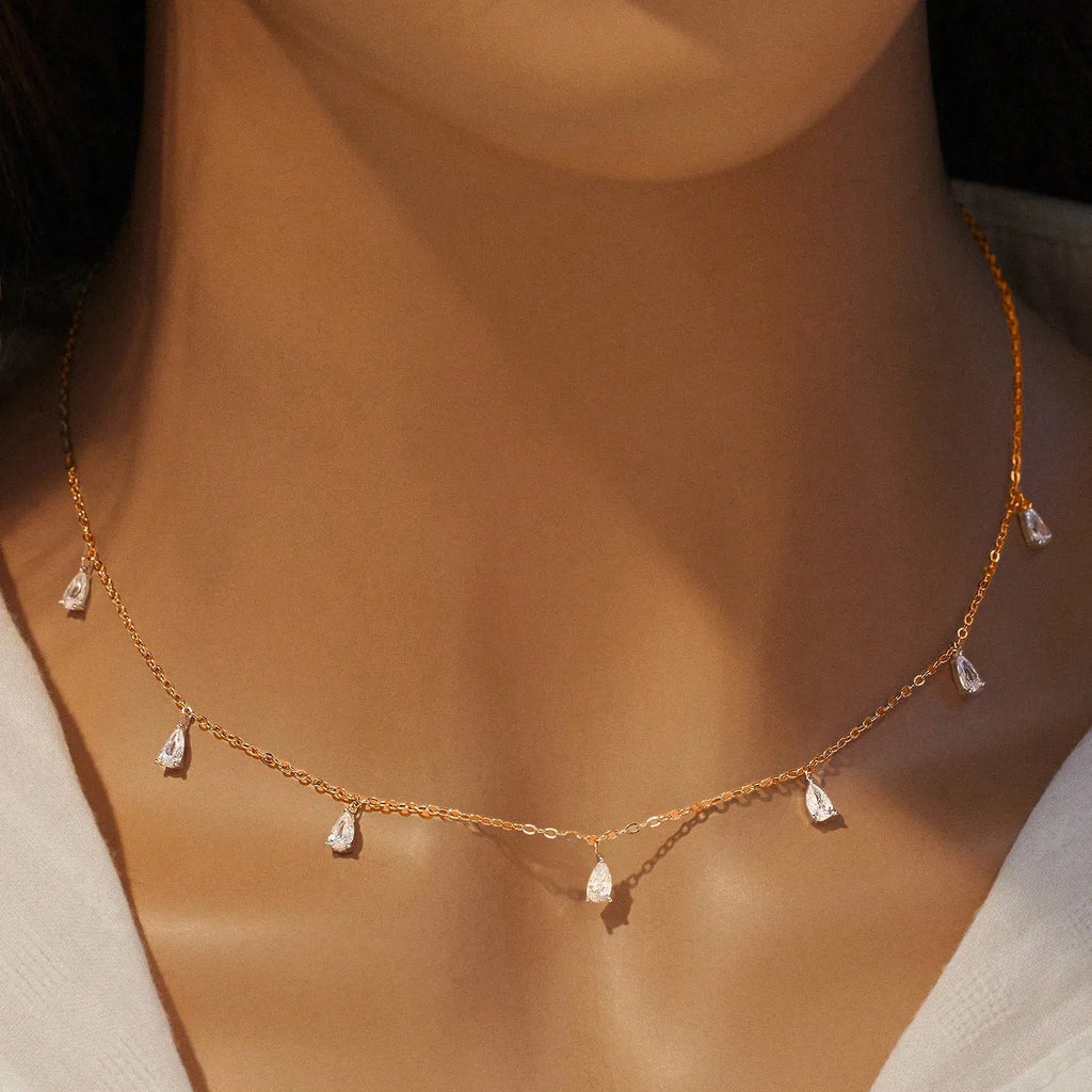 Women's 925 silver drop-shaped artificial zircon necklace on an O-chain, showing silver, rose gold, and golden yellow colour options.